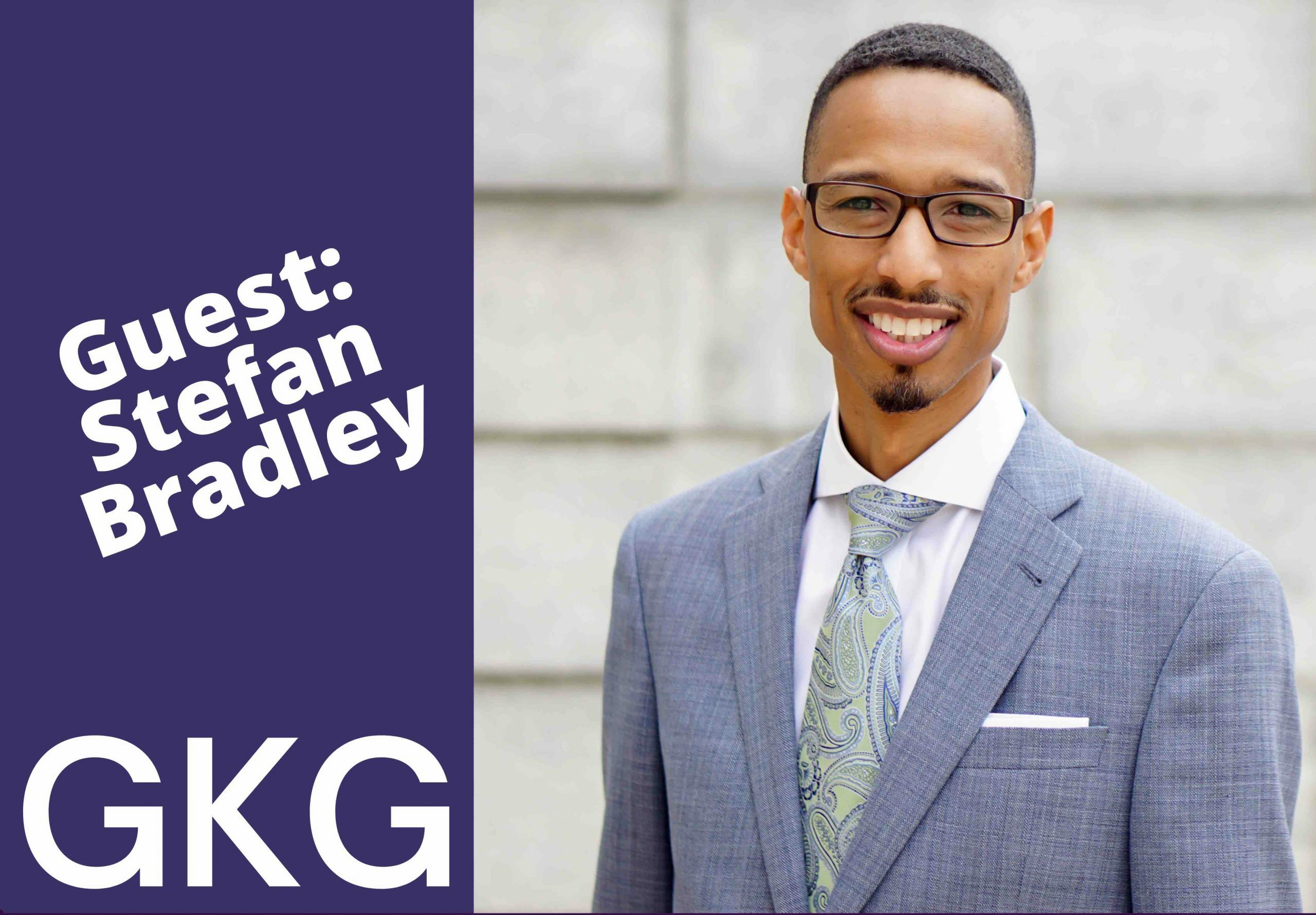 Promotional image featuring a smiling man in a suit with text labels "guest: Stefan Bradley" and "Professional Consulting Services" on a gray background.