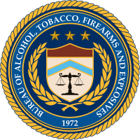 Logo of the bureau of alcohol, tobacco, firearms and explosives (ATF) featuring a shield, scales of justice, and a banner with the year 1972 highlighting Human Capital Management.